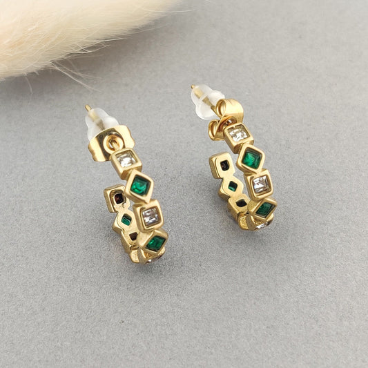 “Gold-plated hoop earrings for women with emerald green and clear square CZ stones.”