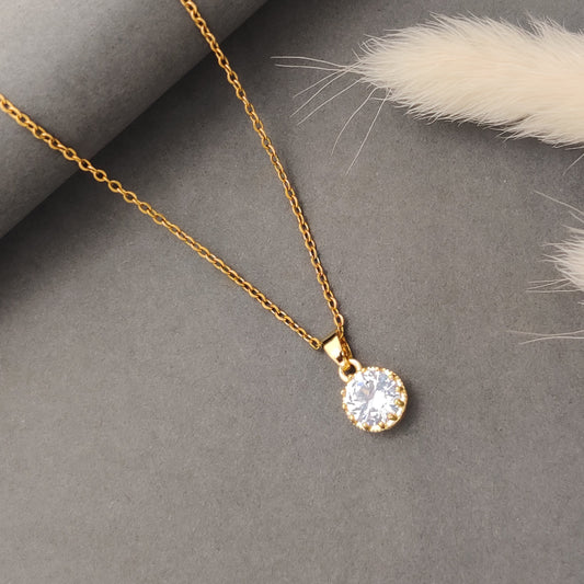 Minimalist round crystal pendant necklace in gold, classic solitaire jewelry for women, elegant everyday layering necklace.
