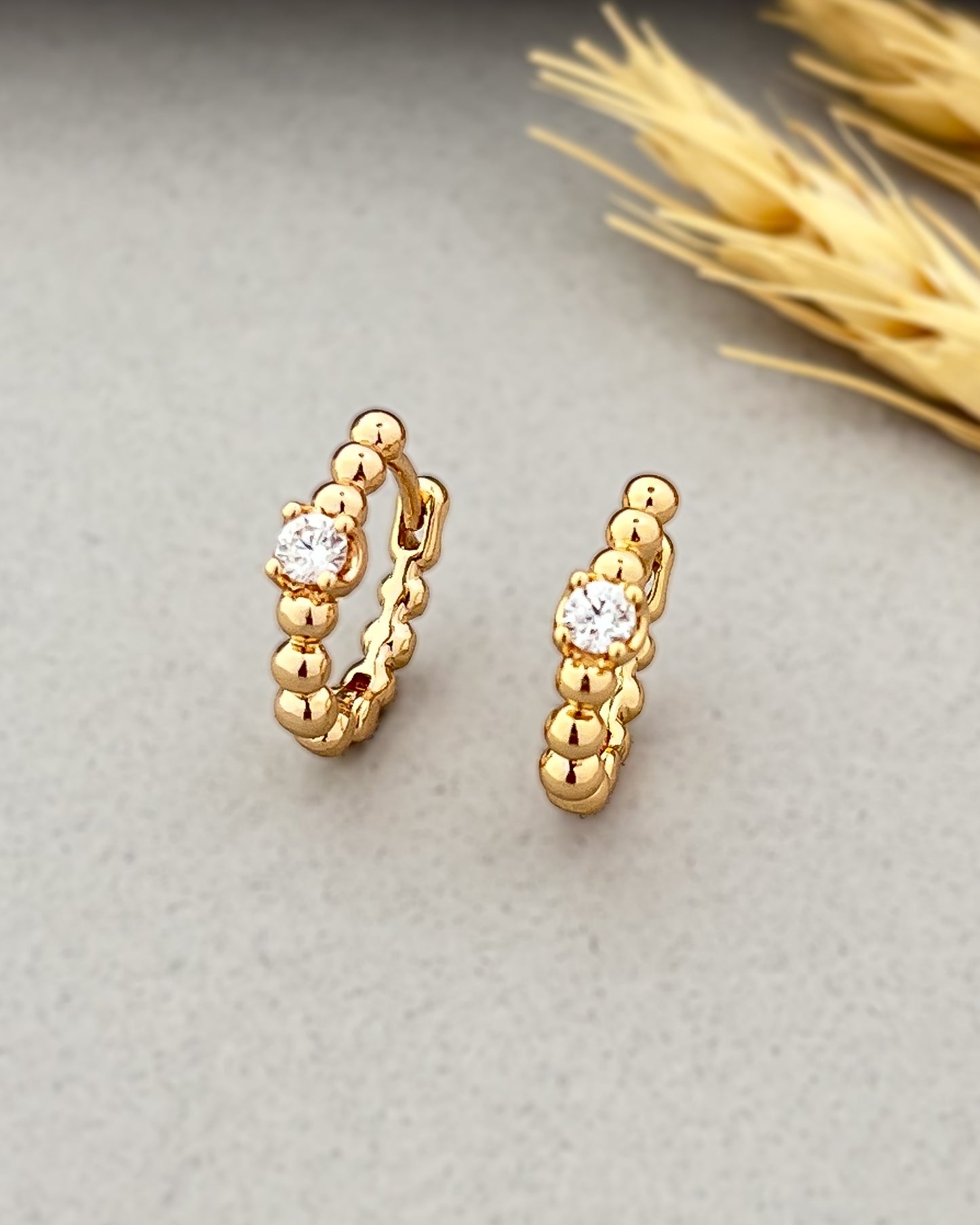 Radiant Huggie Hoops