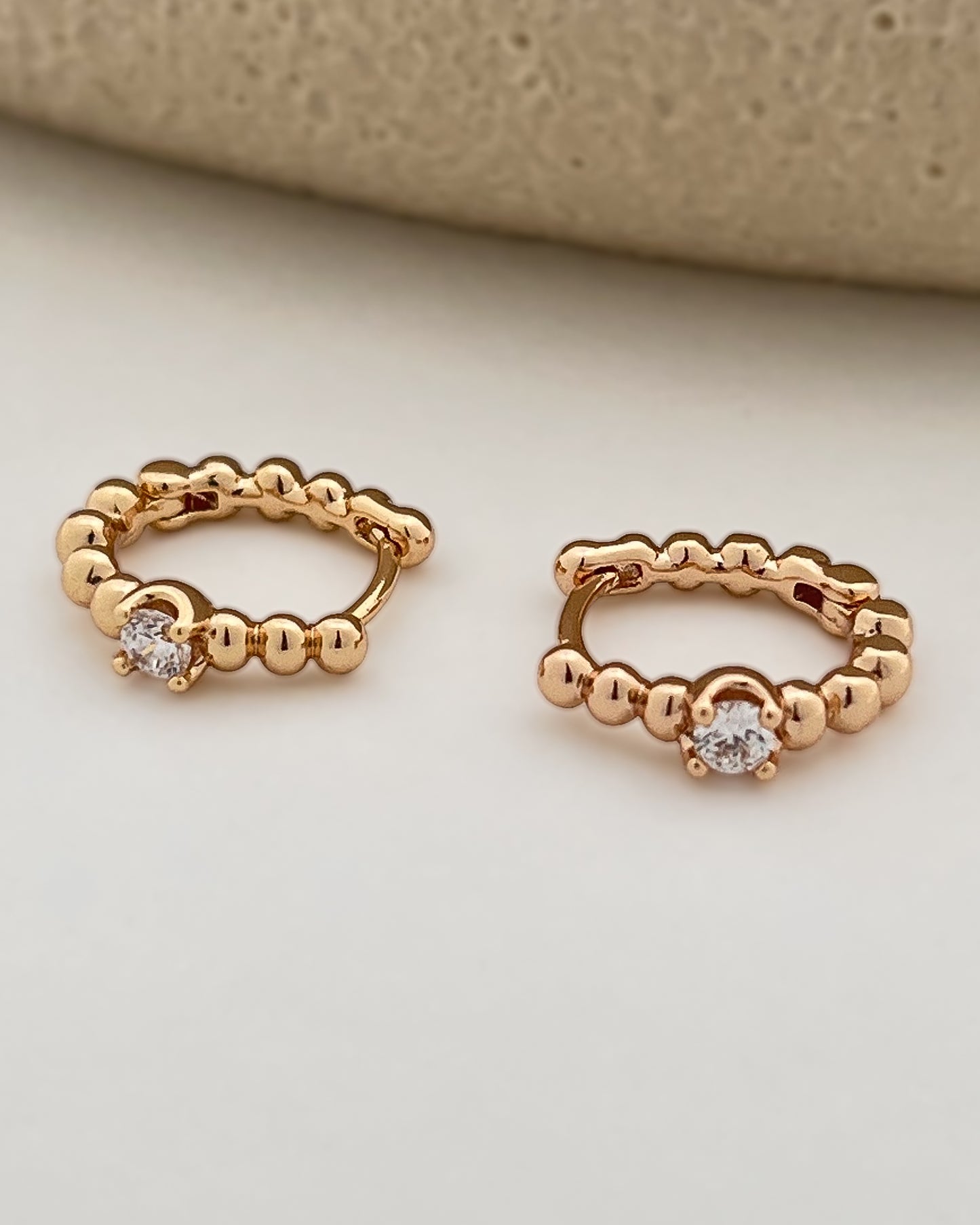 Radiant Huggie Hoops