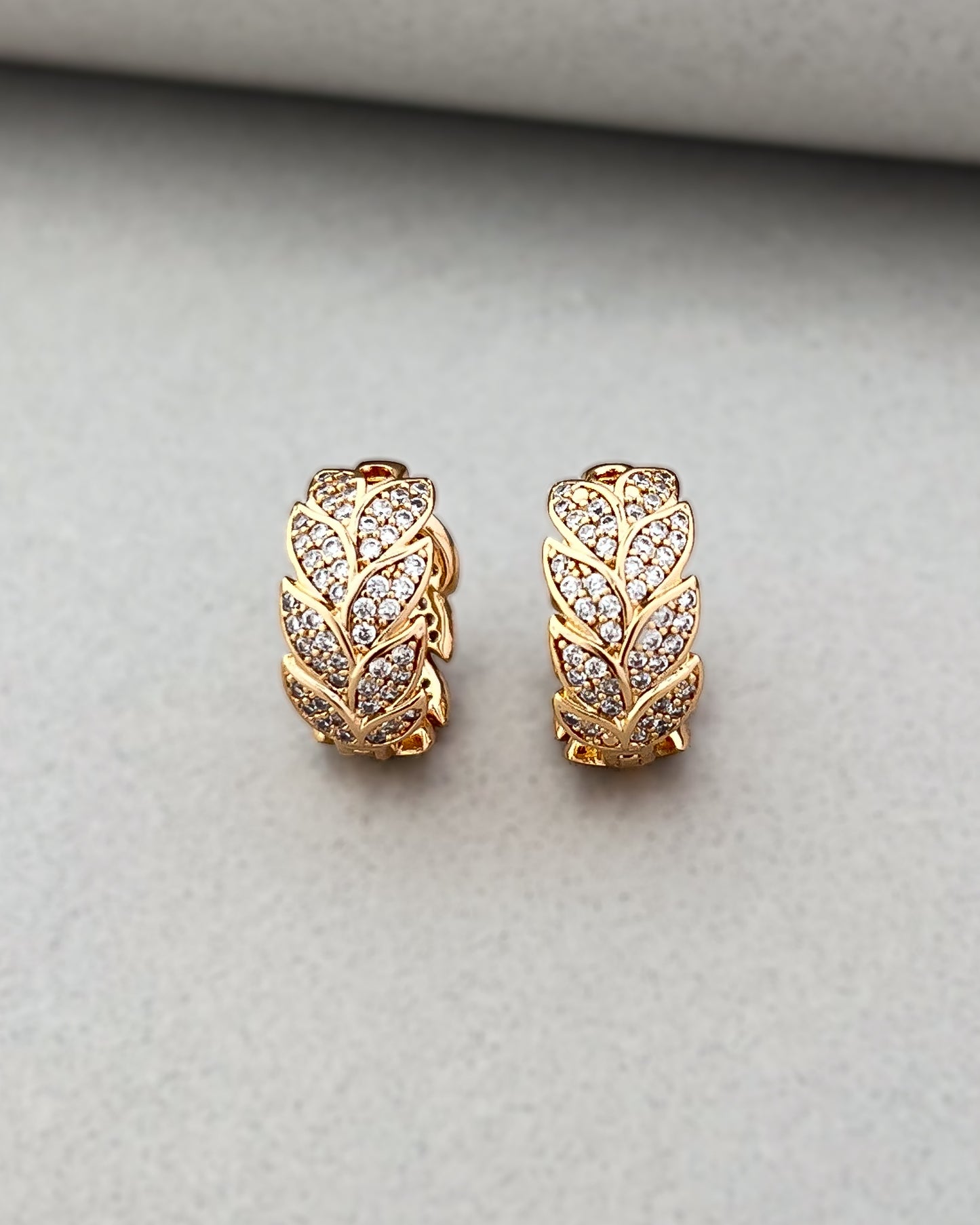 Crystal Leaf Huggie Hoops